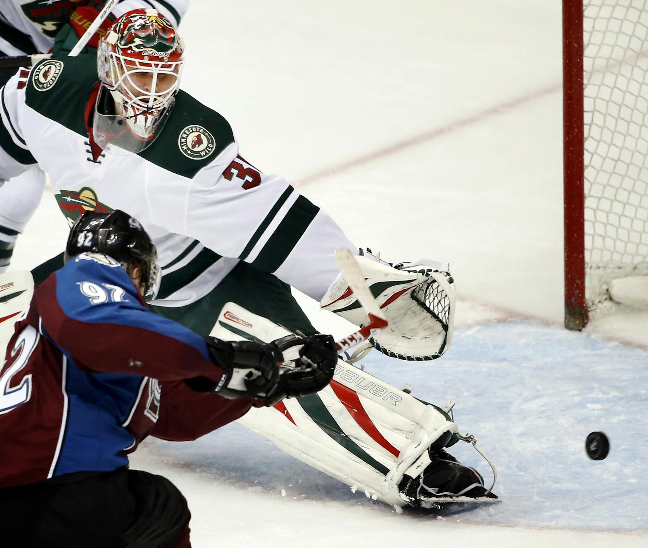 Gabriel Landeskog (92) shot the puck past Minnesota Wild goalie Ilya Bryzgalov (30) for a goal in the second period. ] CARLOS GONZALEZ cgonzalez@startribune.com - April 19, 2014, Denver, Colorado, Pepsi Center, NHL, Minnesota Wild vs. Colorado Avalanche, Stanley Cup Playoffs round 1, Game 2
