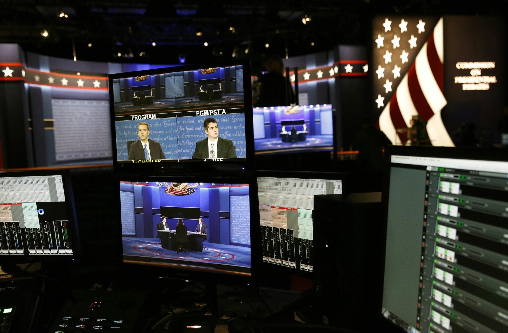 Students siting in on the stage are displayed on television monitors during preparations for the vice-presidential debate between Republican vice-presidential nominee Gov. Mike Pence and Democratic vice-presidential nominee Sen. Tim Kaine at Longwood University in Farmville, Va., Monday, Oct. 3, 2016. (AP Photo/AP Photo/Patrick Semansky)