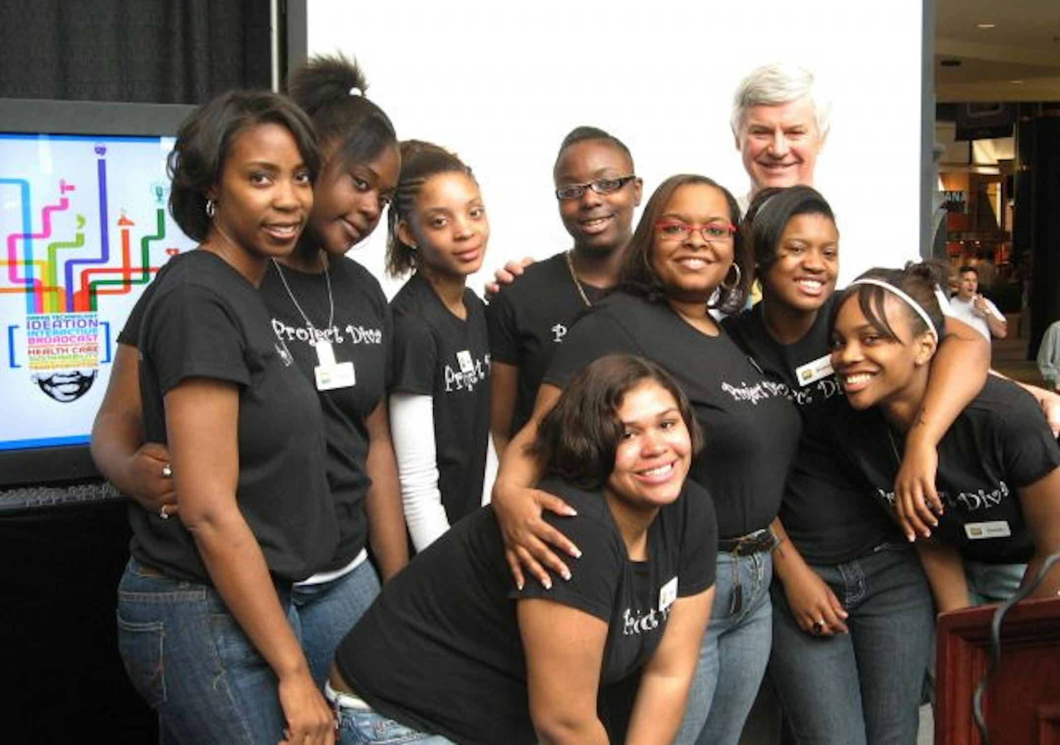 neal St Anthony photo -- The Project Diva counselors and students of Dunwoody Academy and New Salem Baptist Church in north Minneapolis worked with CEO George Johnson of TelAVision.TV on recent Saturdays to help each girl produce a video about her vision and career career goals that was part of the 22-girl organization�s presentation at the �Wired for 2020� business-youth mentoring conference last Saturday at the Mall of America. L to r, Founder of Project Diva Neda Kellogg, Caprice Whimper, Tea