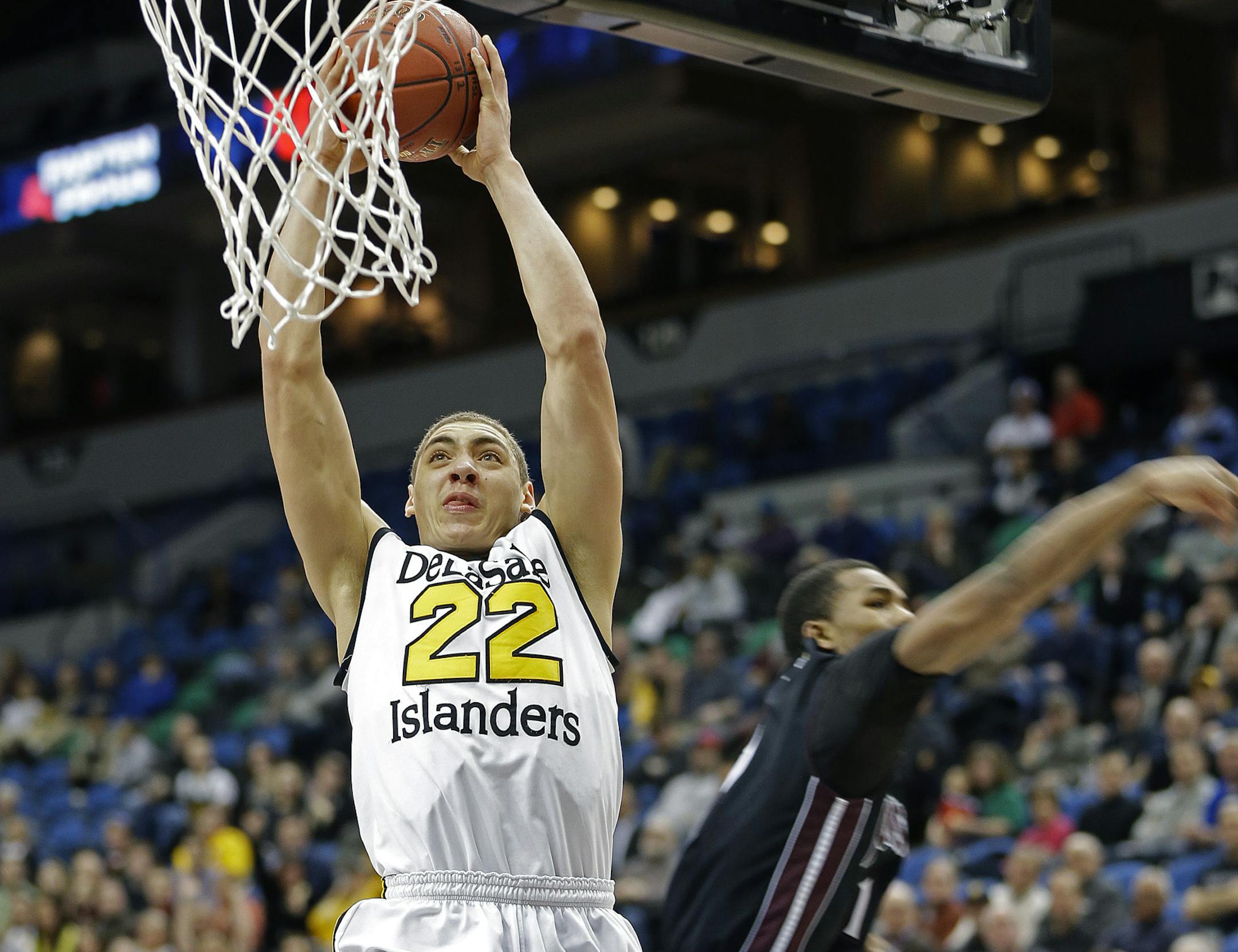 DeLaSalle's Reid Travis dunked the ball during the first half of the boys' basketball Class 3A semifinals at Target Center in March.