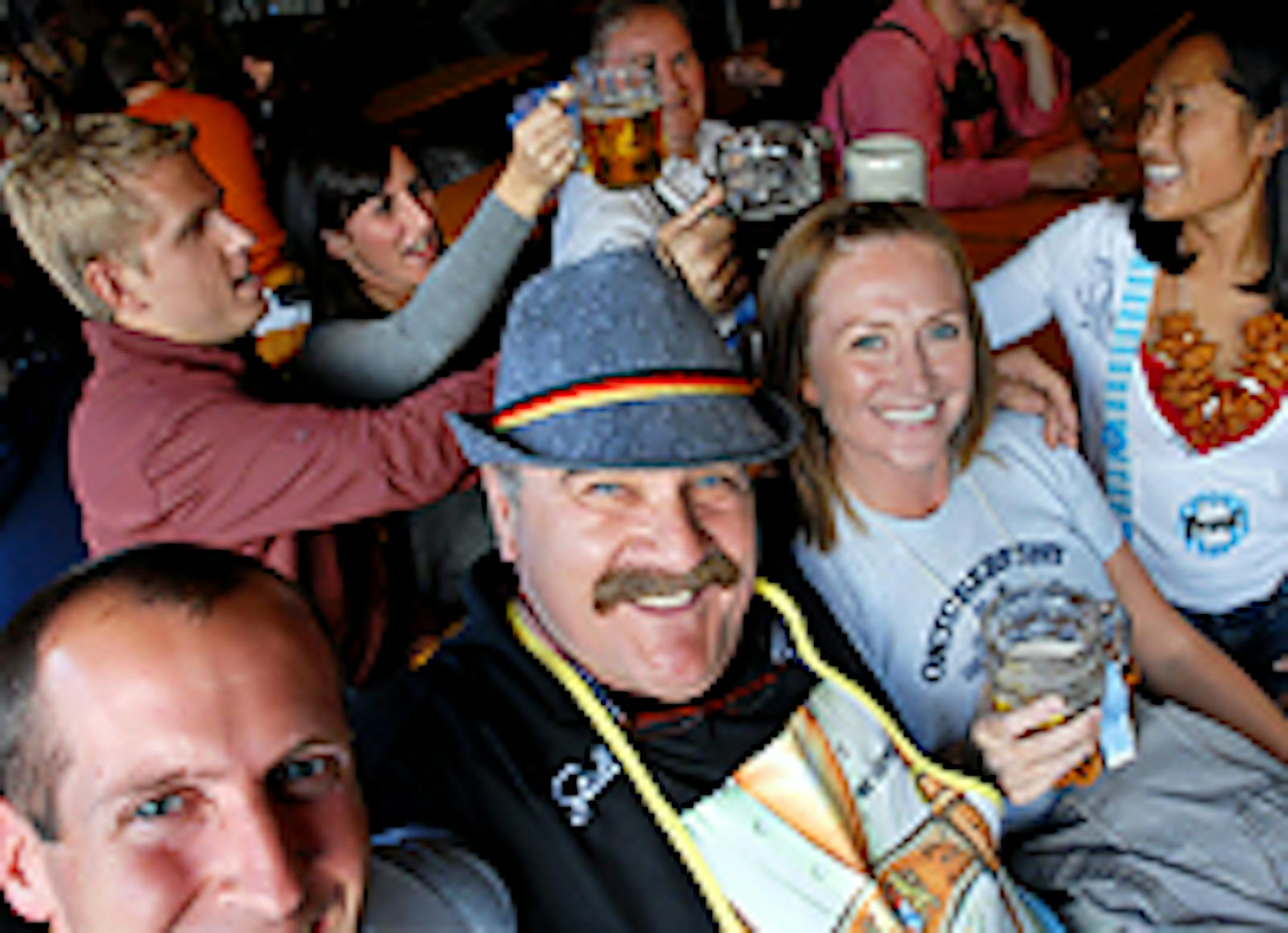 Gasthof owner Mario Pierzchalski with Oktoberfest celebrants