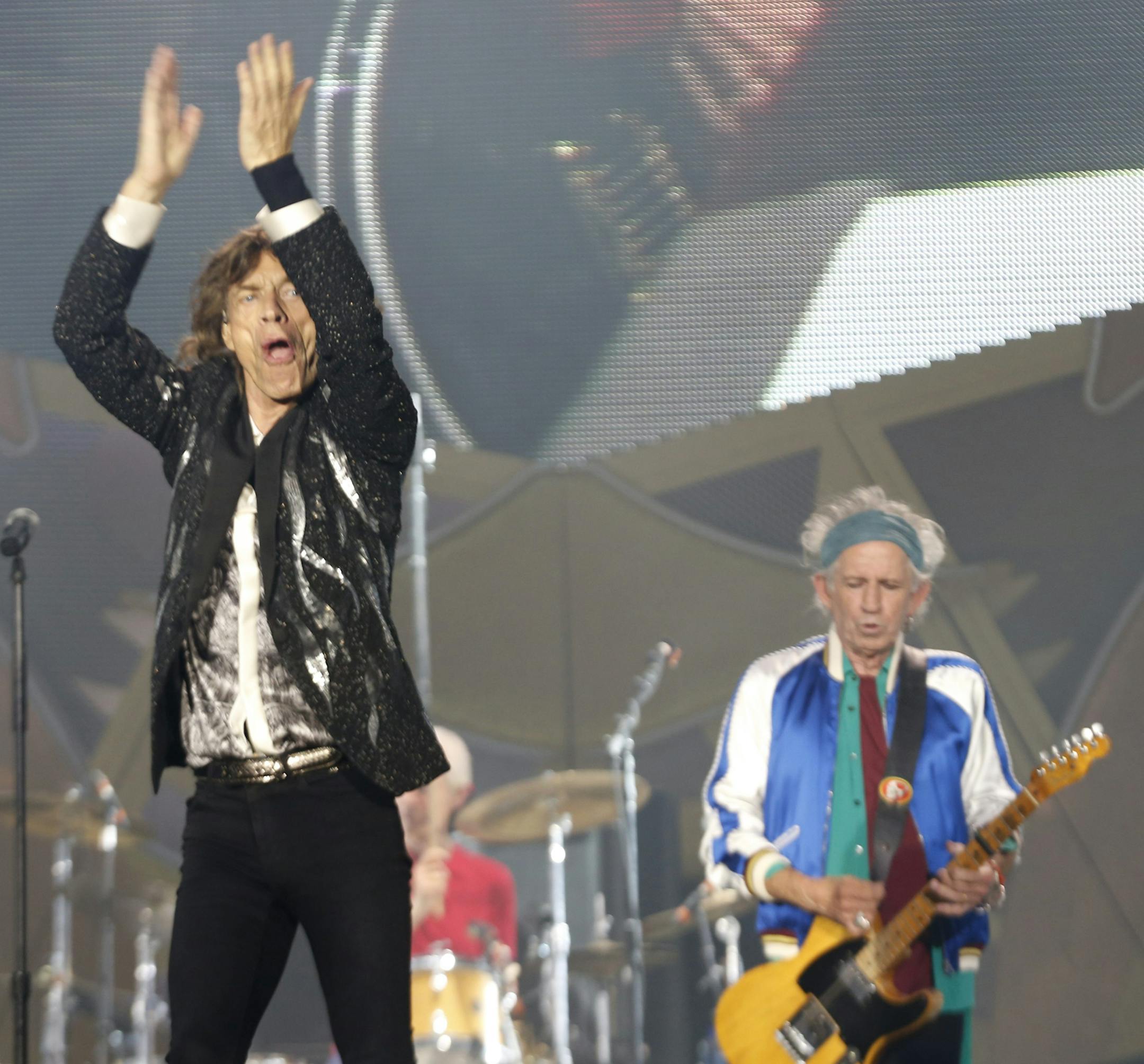 Rolling Stones singer front man Mick Jagger, left, with Keith Richards, right, and drummer Charlie Watts, obscured behind, perform during a concert in the Telenor Arena at Fornebu in Baerum just south of Oslo, Norway, Monday May 26, 2014. The Stones rock combo are on a world wide tour billed as The Rolling Stones On Fire. (AP Photo / Terje Bendiksby, NTB Scanpix) NORWAY OUT