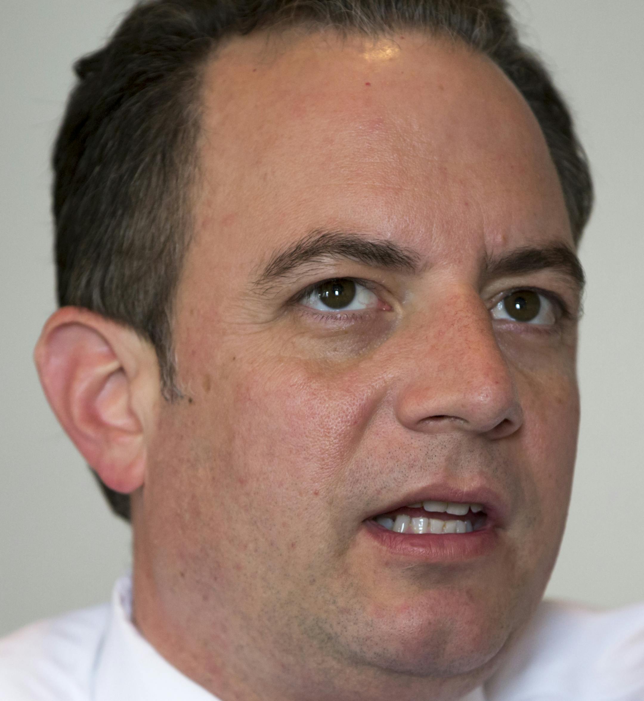 FILE - In this May 13, 2016, file photo, Republican National Committee chairman Reince Priebus speaks at RNC headquarters on Capitol Hill in Washington. Donald Trump can be an effective president, and he’s going to win with you or without you, Priebus told several hundred of the party’s top donors and strategists at the annual business and politics summit hosted by Mitt Romney on Saturday, June 11. (AP Photo/J. Scott Applewhite, File)