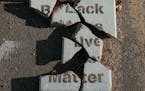 A shattered block at George Floyd Square in Minneapolis, May 14, 2022. Two years after George Floyd's murder, the street art created during that summe
