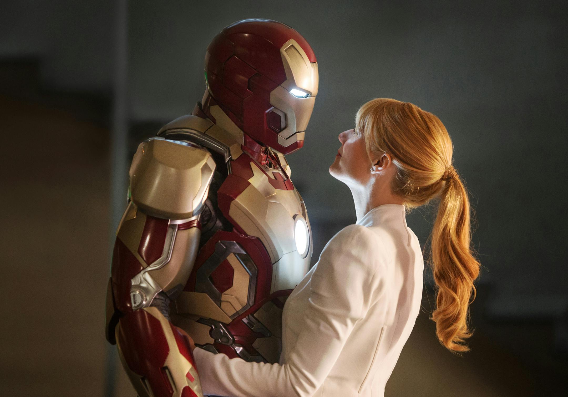 Robert Downey Jr., left, stars as Tony Stark/Iron Man and Gwyneth Paltrow as Pepper Potts in "Iron Man 3."