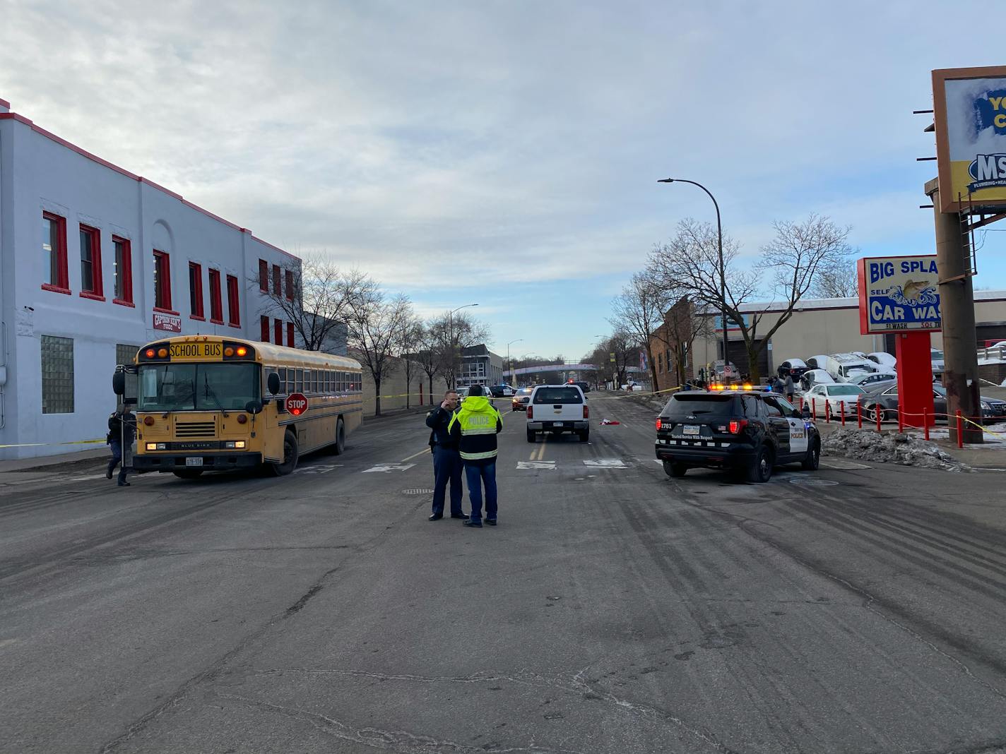 The scene on S. Robert Street in St. Paul where a child was hit by an SUV while getting on a school bus Thursday morning, Feb. 27, 2020.