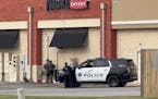 Police respond to an incident in the Lewis Crossing Shopping Center on Saturday, April 6, 2024 in Conway, Ark.