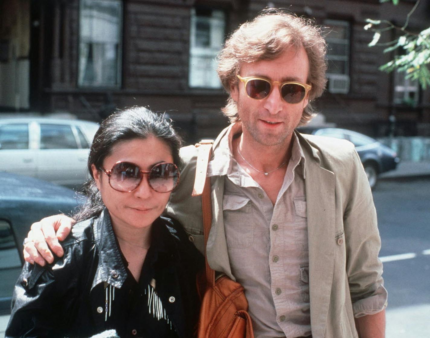 In this Aug. 22, 1980, file photo, John Lennon and his wife Yoko Ono arrive at the Hit Factory, a recording studio in New York City.