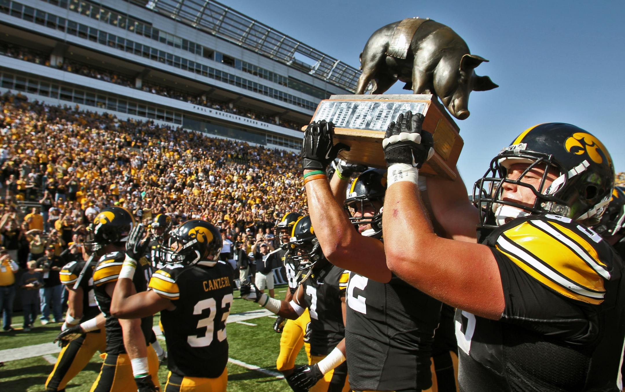 Minnesota Gophers vs. Iowa Hawkeyes football. Iowa won 31-13. Iowa players carried the Floyd of Rosedale trophy off the field at the end of the game and victory over Minnesota. (MARLIN LEVISON/STARTRIBUNE(mlevison@startribune.com