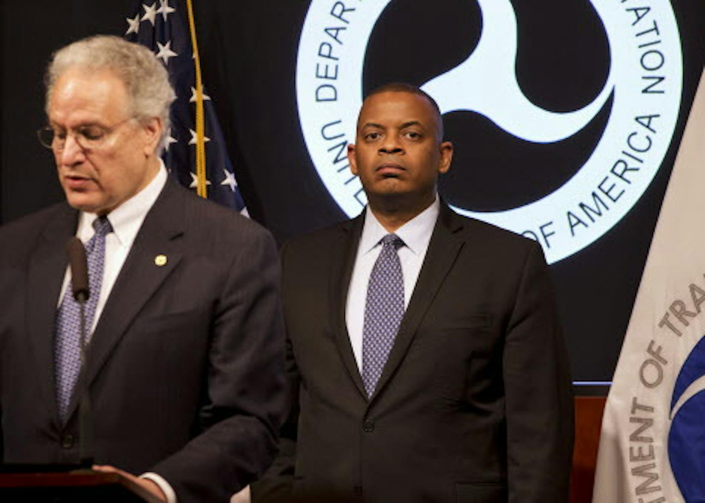 Transportation Secretary Anthony Foxx, right, listens as NHTSA Administrator Mark Rosekind speaks about the Takata Corp. air bag inflator recall during a news conference at the Transportation Department in Washington, Tuesday May 19, 2015. (AP Photo/Jacquelyn Martin)