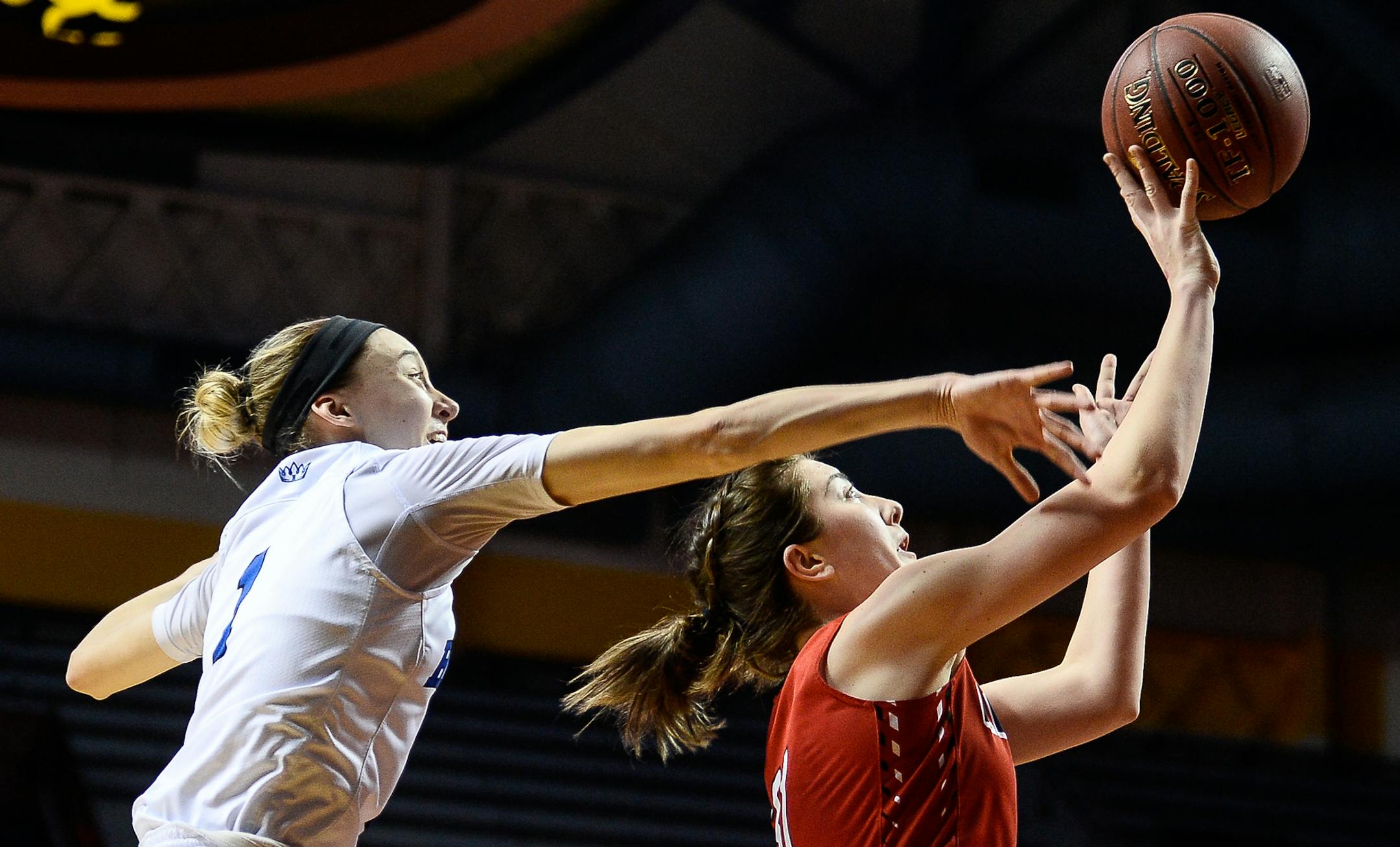 Elk River guard Danielle Lachmiller (31) hit a jump shot while being defended from behind by Hopkins guard Paige Bueckers (1) in the first half. ] AARON LAVINSKY ï aaron.lavinsky@startribune.com Elk River played Hopkins in the Class 4A girls' basketball championship game on Saturday, March 18, 2017 at Williams Arena in Minneapolis, Minn.