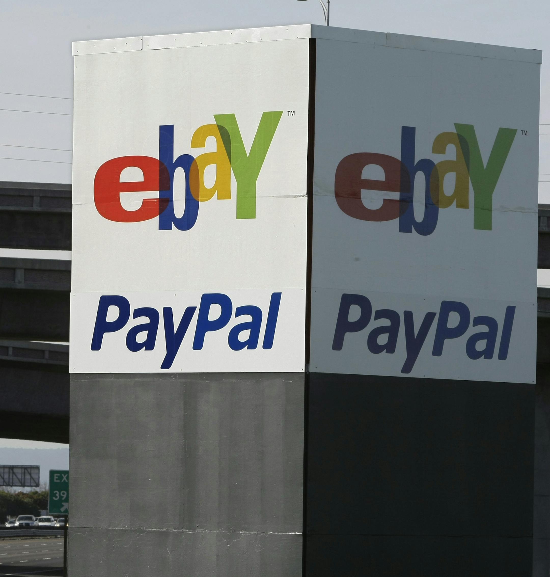 An eBay/PayPal sign is shown in San Jose, Calif., Wednesday, Jan. 19, 2011. EBay Inc. says its fourth-quarter revenue rose, as the healthy holiday shopping season bolstered growth in its PayPal online payments business and online marketplace. (AP Photo/Paul Sakuma)