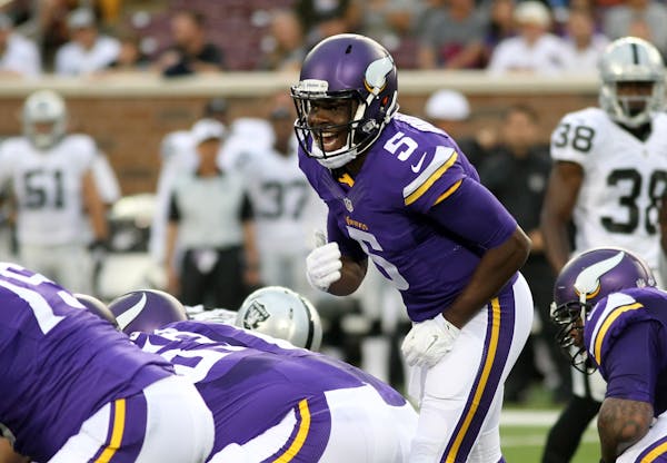 Minnesota Vikings quarterback Teddy Bridgewater yells out signals during the first half of a preseason NFL football game against the Oakland Raiders, 
