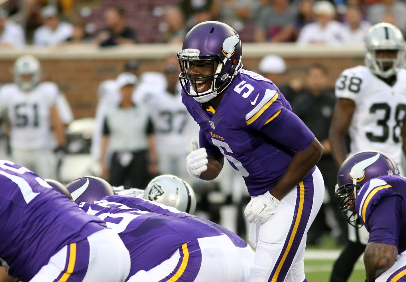 Minnesota Vikings quarterback Teddy Bridgewater yells out signals during the first half of a preseason NFL football game against the Oakland Raiders, Saturday, Aug. 22, 2015, in Minneapolis. (AP Photo/Andy King)