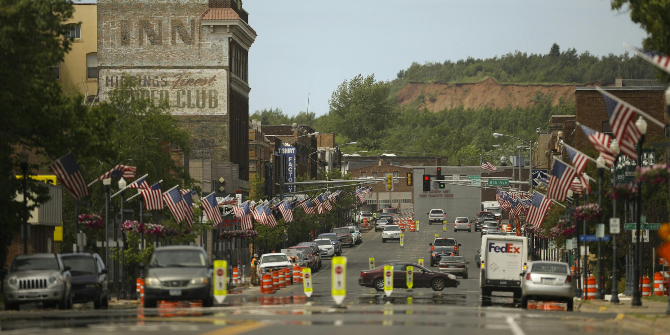 Hibbing's E. Howard St. was decorated with American flags for Flag Day and July 4th, as seen early Thursday morning. ] JEFF WHEELER ï jeff.wheeler@startribune.com The economy on the Iron Range is in a boom cycle currently with mines operating and new business betting on the current upswing lasting. The breakfast rush at Baileyís Courtyard CafÈ in downtown Hibbing was photographed Thursday morning June 14, 2018.