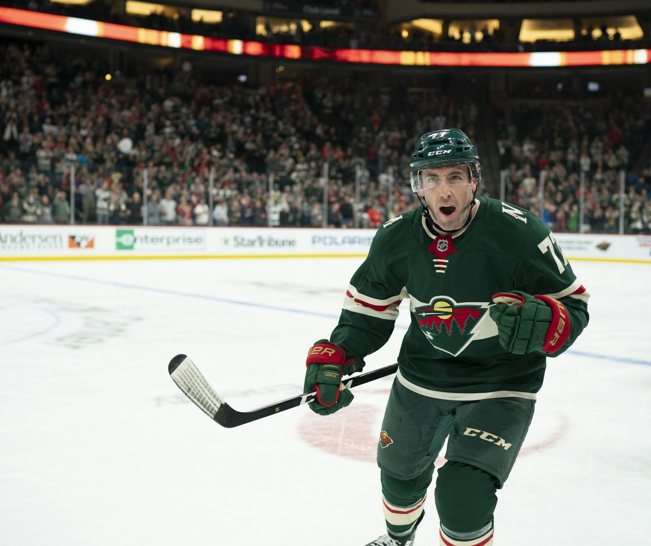 Minnesota Wild defenseman Brad Hunt (77) approached the bench to celebrate his game tying goal in the third period.