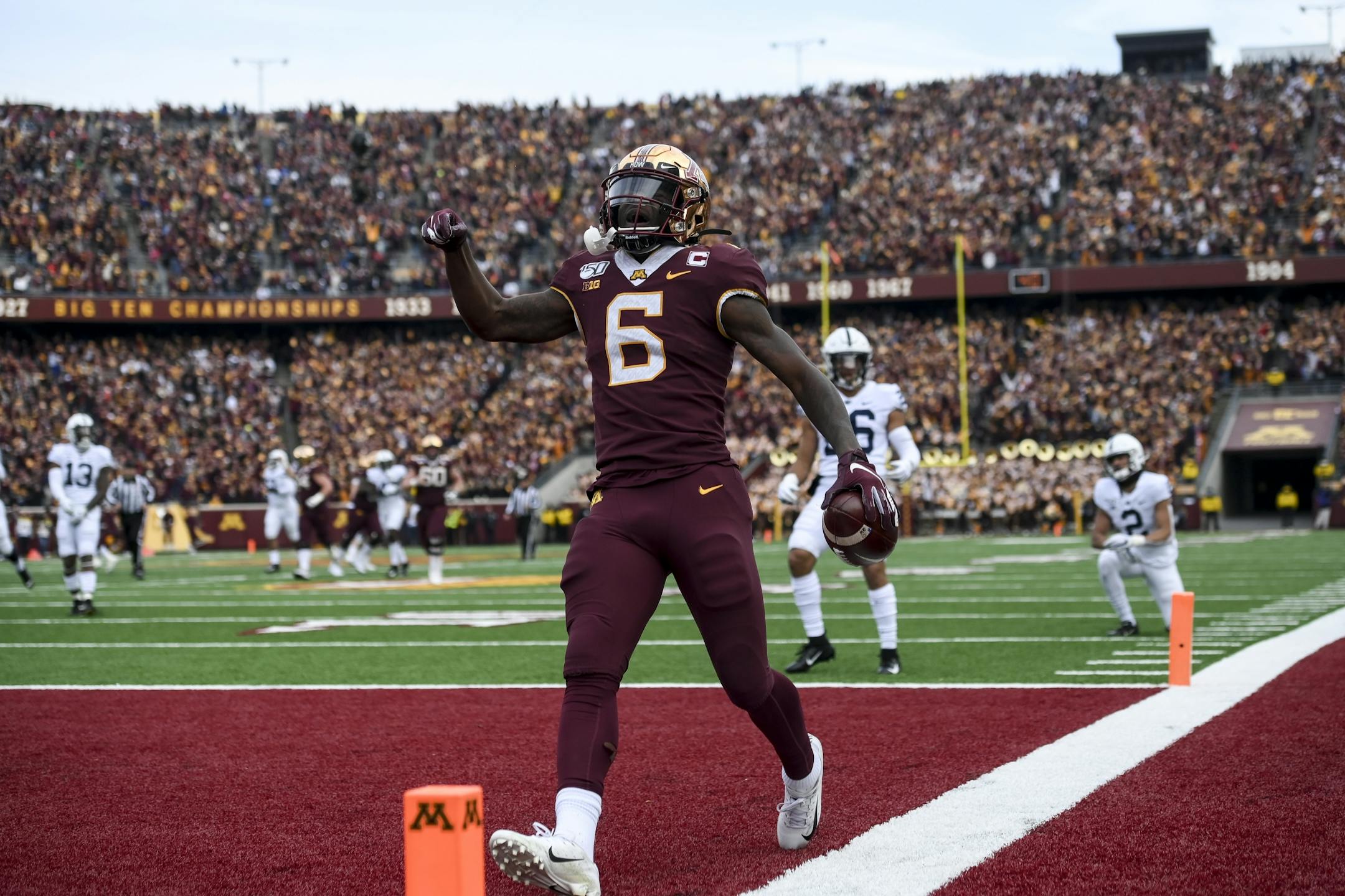 Minnesota Gophers wide receiver Tyler Johnson (6) celebrated his second quarter touchdown against the Penn State Nittany Lions.