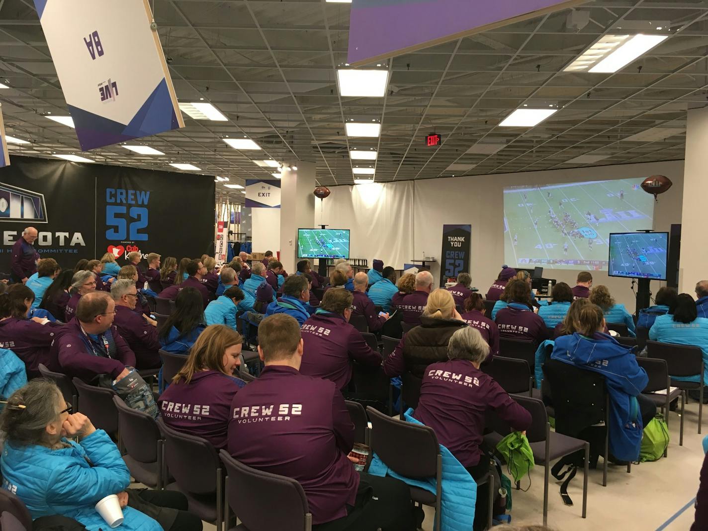 The last shift of Crew 52, the official volunteer group of the Minnesota Super Bowl Host Committee, watched the first half of the game together on Sunday night. The last volunteers stood in the skyways until around 11 p.m. guiding fans to hotels and restaurants.