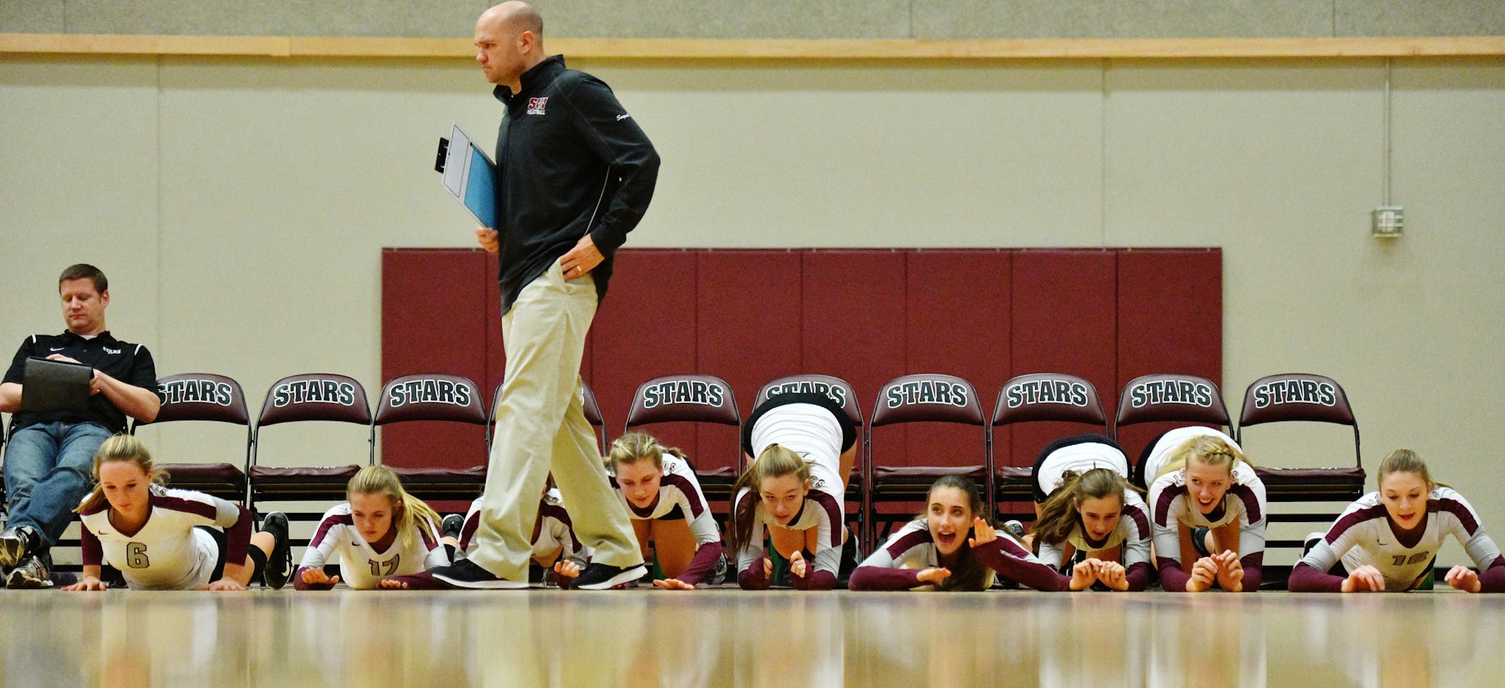 The Southwest Christian bench celebrated a point during the third set. ] MARK VANCLEAVE ï mark.vancleave@startribune.com * Southwest Christian hosted Heritage Christian on Tuesday, Oct. 11, 2017.