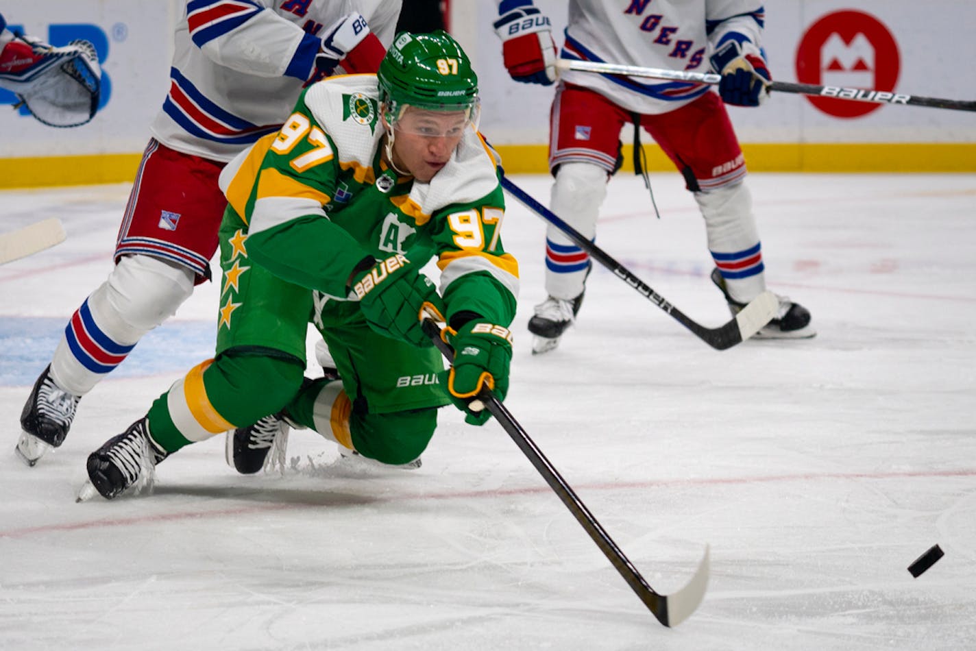 Minnesota Wild forward Kirill Kaprizov (97) swipes at the puck during second period at Xcel Energy Center in St. Paul, Minn., on Saturday, Nov. 4, 2023. ] Angelina Katsanis • angelina.katsanis@startribune.com