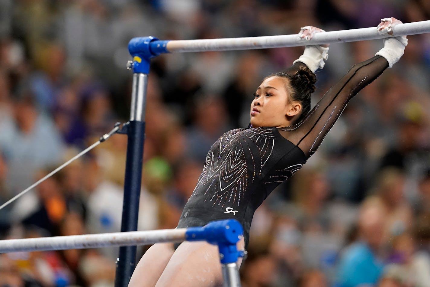 Sunisa Lee competes on the uneven bars during the U.S. Gymnastics Championships, Sunday, June 6, 2021, in Fort Worth, Texas. (AP Photo/Tony Gutierrez)