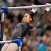 Sunisa Lee competes on the uneven bars during the U.S. Gymnastics Championships, Sunday, June 6, 2021, in Fort Worth, Texas. (AP Photo/Tony Gutierrez)