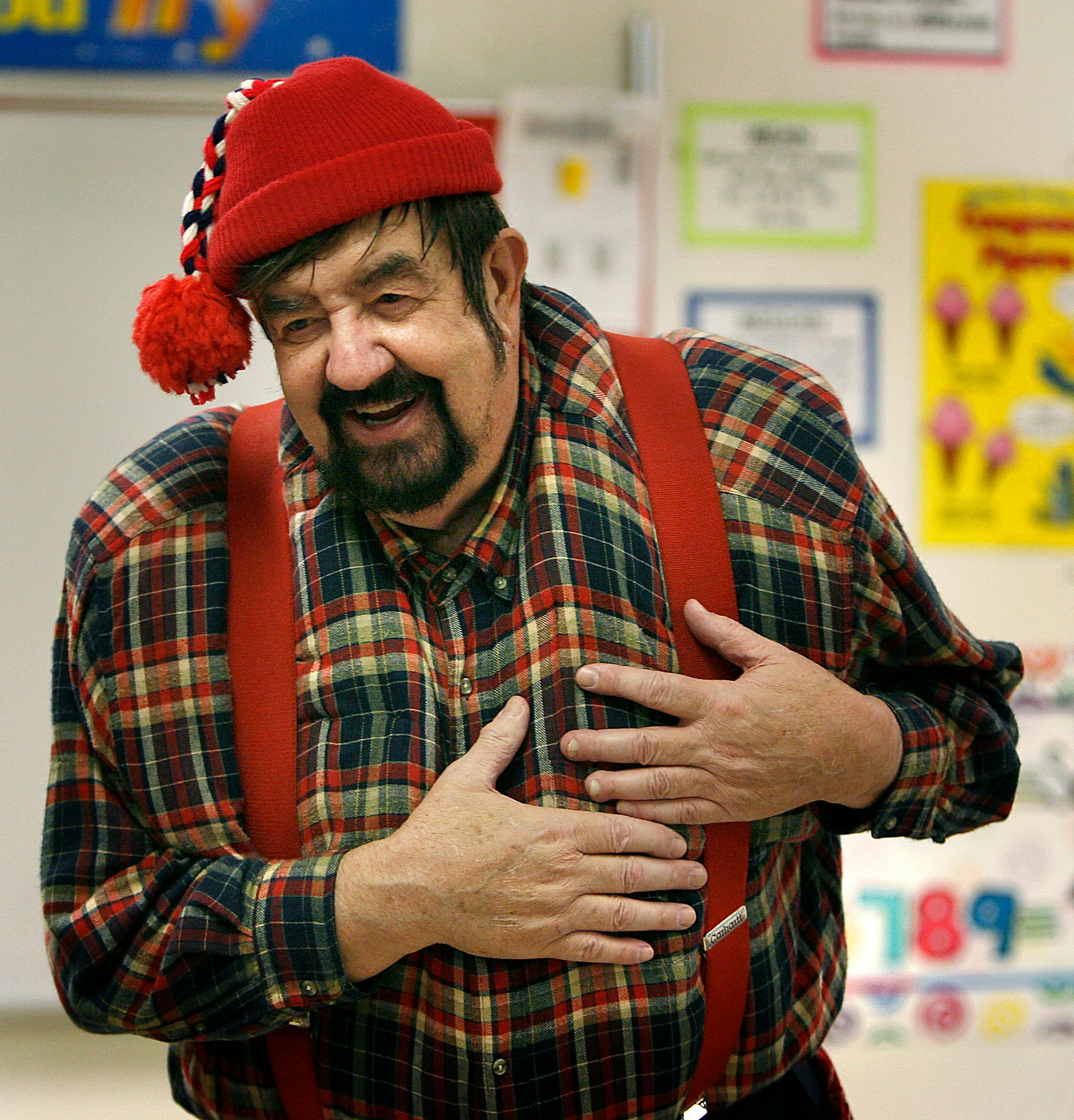 October 30, 2008 - Norwood Young America, MN - "And that's the tall tale truth," said Pastor Richard Mark as he made a presentation to fifth-grade students at Central Elementary School. Mark is a pastor and preaches on Sundays. He impersonates Paul Bunyan during the week where he teaches about the Paul Bunyan tales to schools and nursing homes.