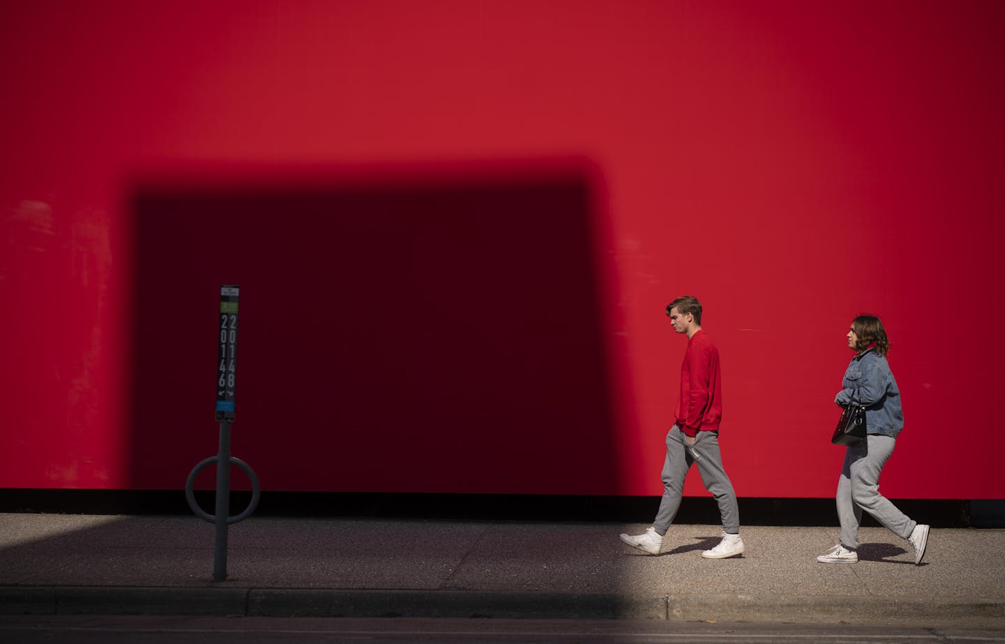 Two people seeking to go into the Guthrie Theater walked away after the found the doors were closed Sunday afternoon. ] JEFF WHEELER &#x2022; Jeff.Wheeler@startribune.com The Guthrie Theater, which ordinarily would have had matinee and evening performances Sunday, March 15, 2020, was dark due to the public health crisis that is the coronavirus. Also, the building itself, normally open to the public regardless of the performance schedule, was closed.