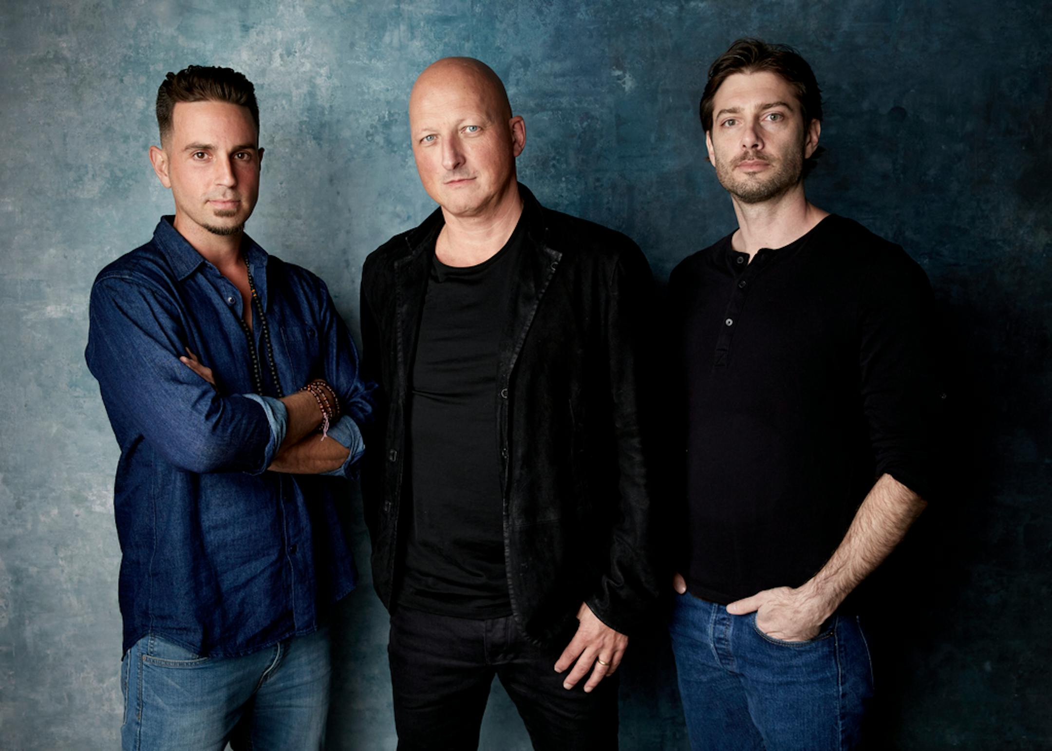 Wade Robson, director Dan Reed and James Safechuck posed for a portrait to promote the film "Leaving Neverland" during the 2019 Sundance Film Festival in Park City, Utah.