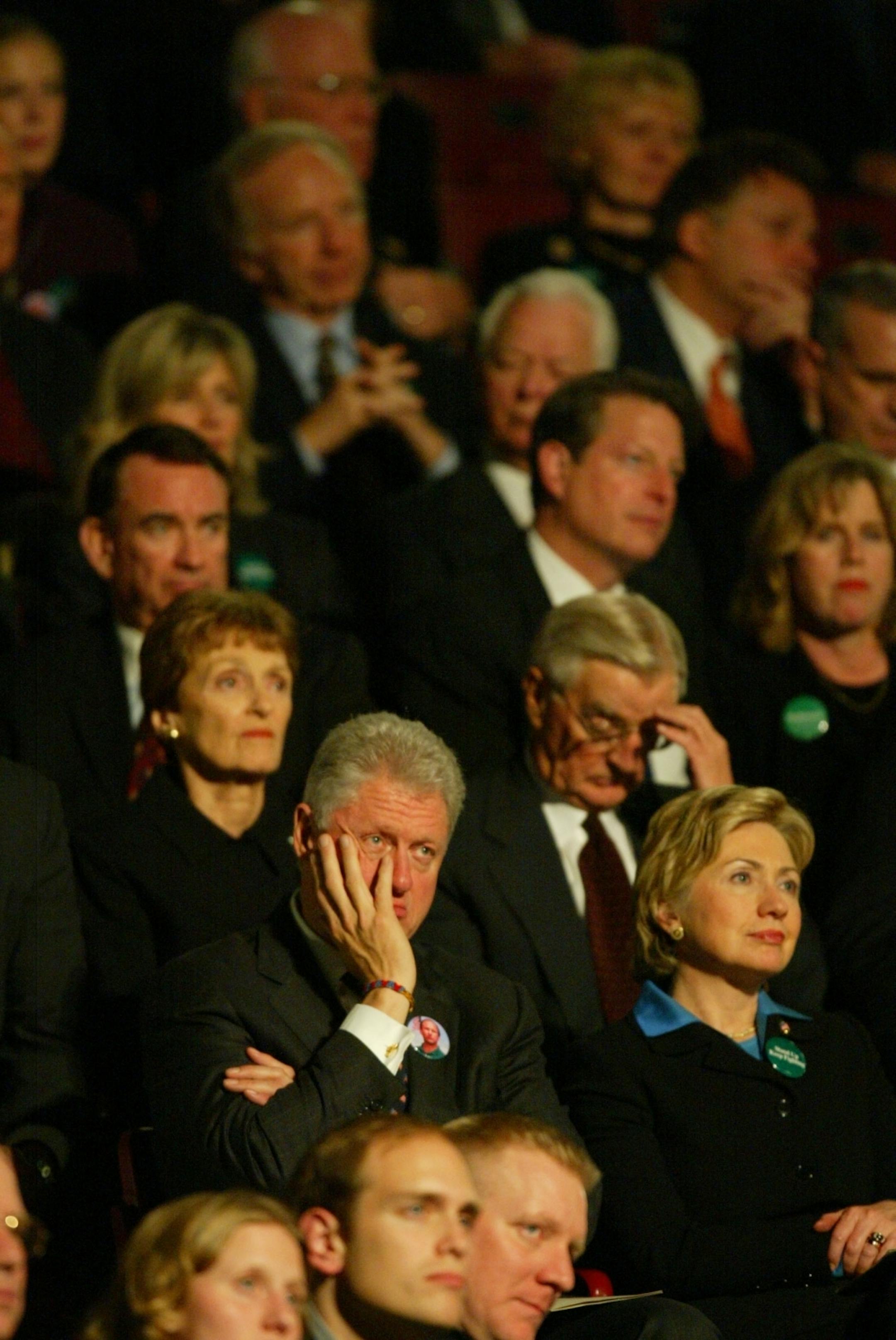 October 29,2002: Minneapolis,MN - Williams Arena - Memorial Service for Sen. Paul Wellstone - The Clintons and the rest of the congressional delegation listen to Mark Wellstone's speech.