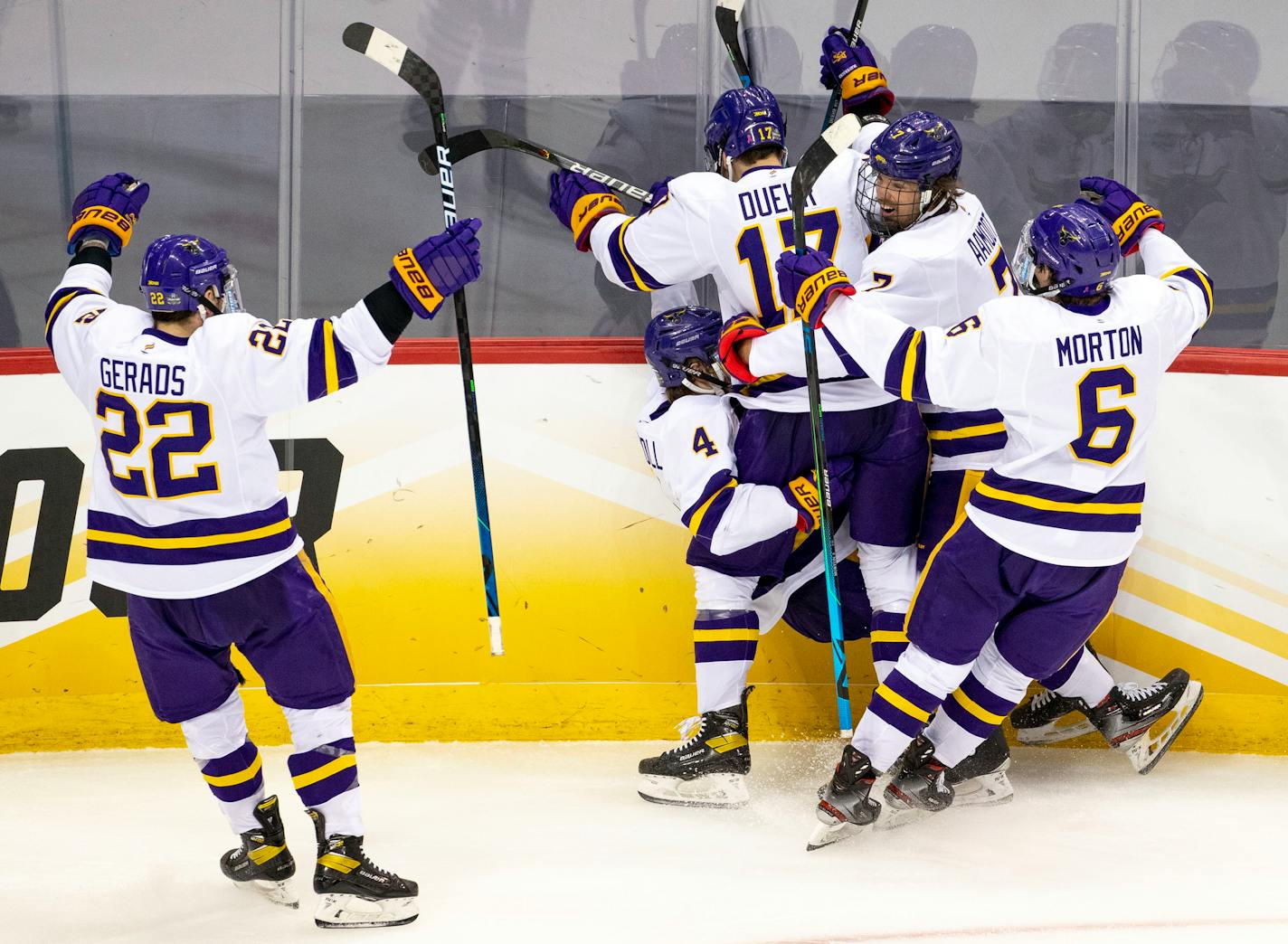 Minnesota State Mankato players celebrated after defenseman Andy Carroll (4) scored a goal to bring the Mavericks to within one in the second period.    ]