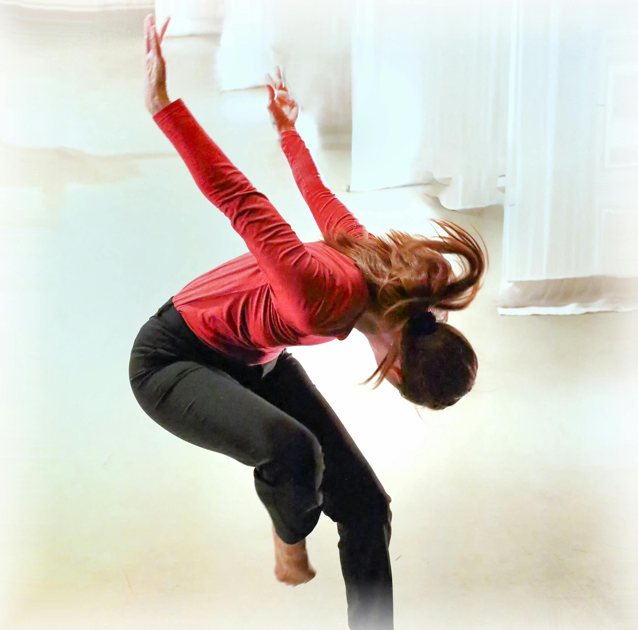 Jennifer Mack in "DIVE," a dance work exploring resilience of the human spirit in the face of adversity, Photo by Steve Peterson.