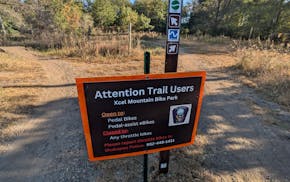 Keepers of the Xcel Mountain Bike Park have put up signs to curtail e-moto bikes on their trails.