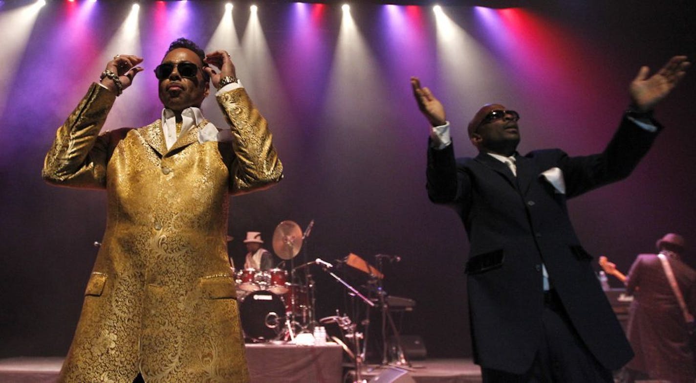 Morris Day and his sidekick Jeromw Benton.Review of the Original 7ven, the 7 original members of the Time were in a rare hometown concert at the Stae Theater Saturday night. [ TOM WALLACE • twallace@startribune.com _ Assignment _#20020452A__November 5, 2011 _ SLUG: original1107_ EXTRA INFORMATION: The band members are Jellybean Johnson on drums, Jimmy Jam and Monte Moir on keyboards, and Terry Lewis on bass. To this base were added Jesse Johnson on guitar and a lead singer and childhood friend n