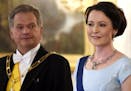 President of Finland Sauli Niinist' and his wife Jenni Haukio await the start of the dinner held at the Presidential Castle during the visit of the No