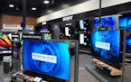 Televisions from various manufactures sit on display at Best Buy’s “experience store” in Minnetonka in March of 2023. 
