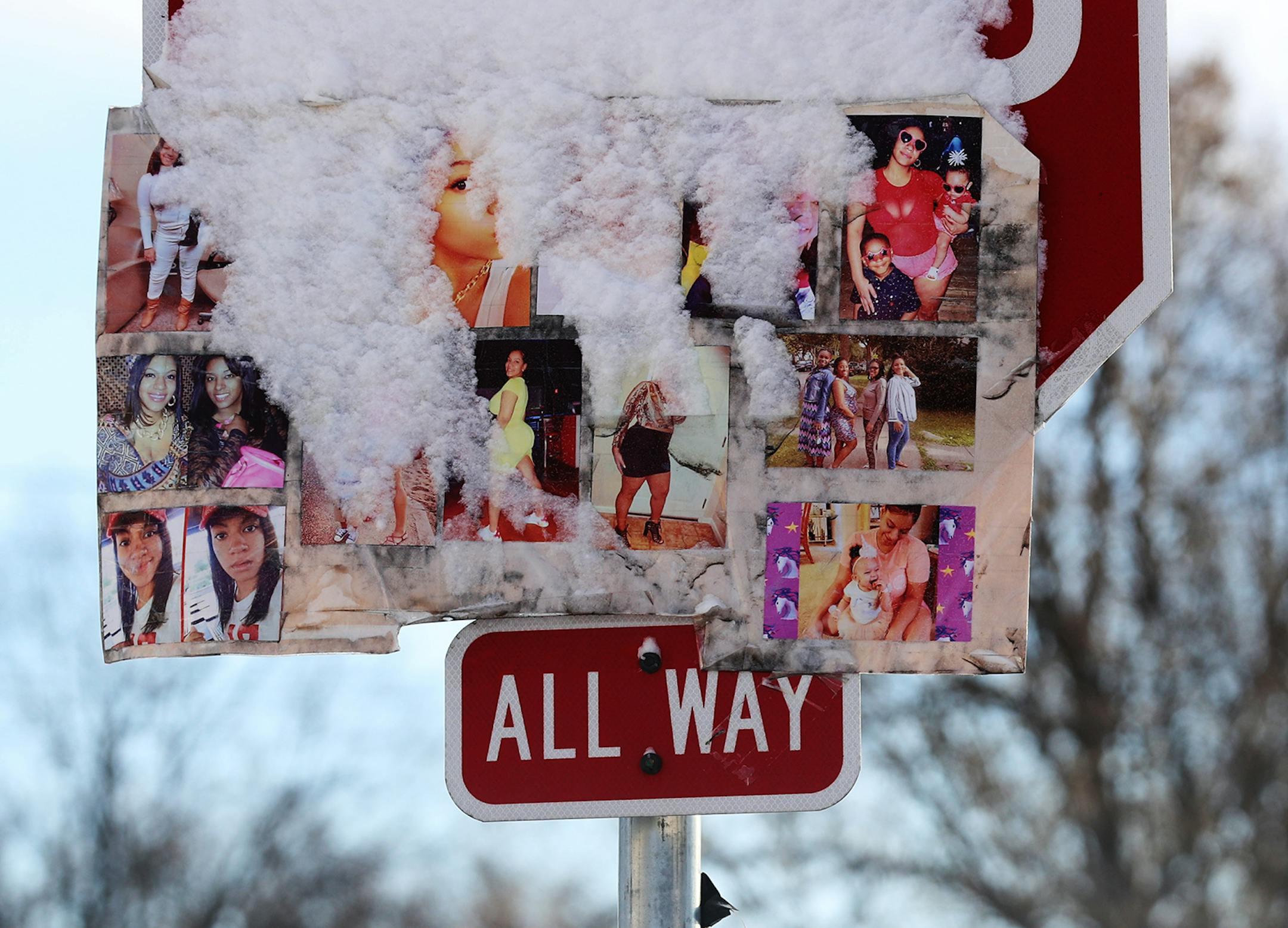 Photos of Leneesha Columbus, 27, coat a stop sign at 37th St. E. and Elliott Ave. near George Floyd Square and seen Wednesday in Minneapolis. Columbus was shot and killed earlier in the summer while six months pregnant by her boyfriend.