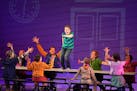 Huxley Westemeier (on table) is one of two actors playing Greg Heffley in “Diary of a Wimpy Kid” at Children’s Theatre Company.