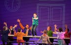 Huxley Westemeier (on table) is one of two actors playing Greg Heffley in “Diary of a Wimpy Kid” at Children’s Theatre Company.