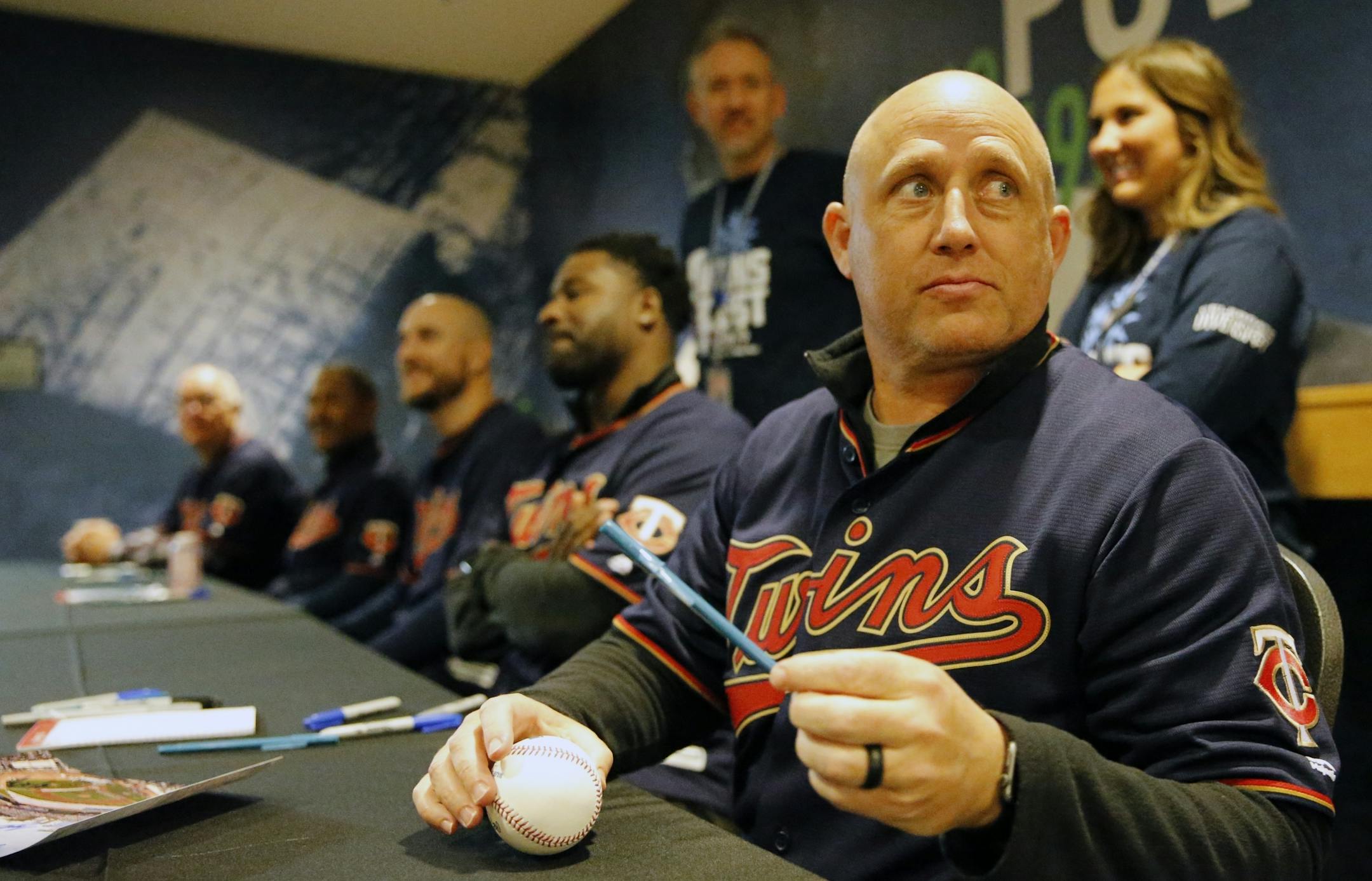 Twins pitching coach Wes Johnson signed autographs during TwinsFest.