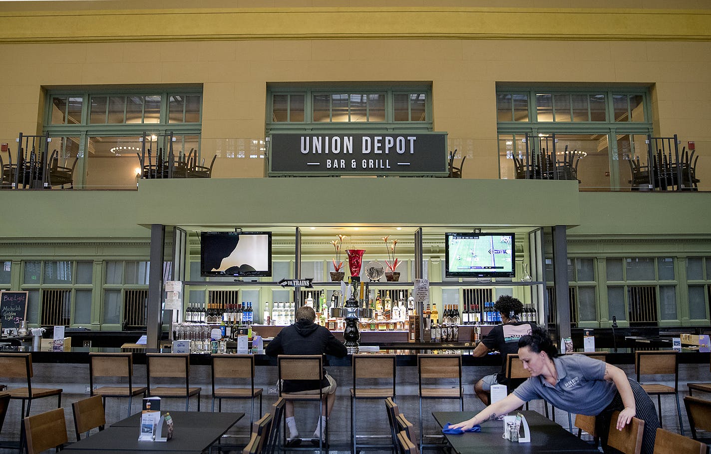 Union Depot Bar and Grill server Molly Ruhoff worked the tables at the new restaurant and bar just after the lunch rush, Friday, August 24, 2018 in St. Paul, MN. ELIZABETH FLORES ï liz.flores@startribune.com