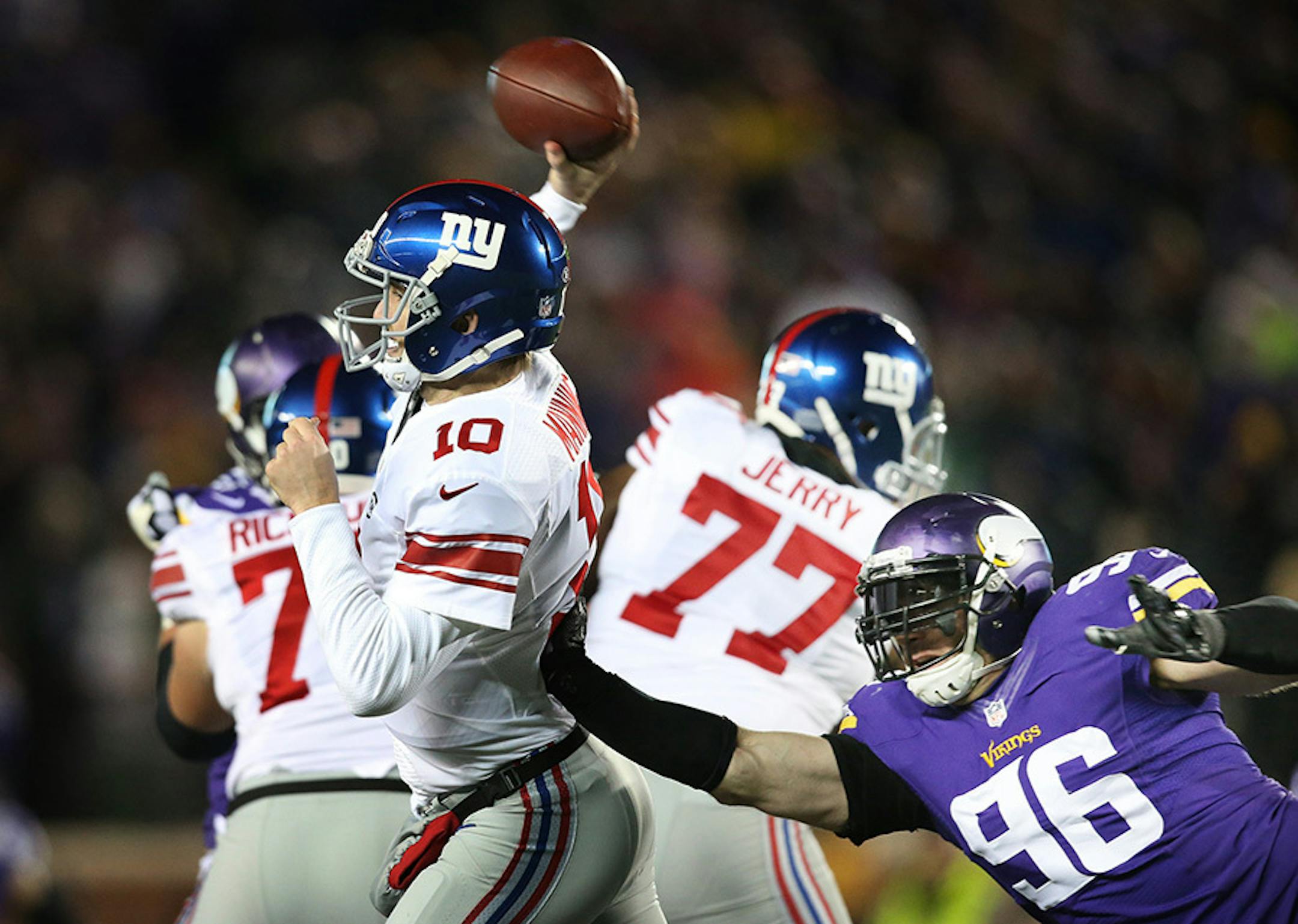 New York Giants quarterback Eli Manning (10) was pressured into throwing an incomplete pass by Minnesota Vikings defensive end Brian Robison (96) in the third quarter Sunday December 27, 2015 in Minneapolis, MN.