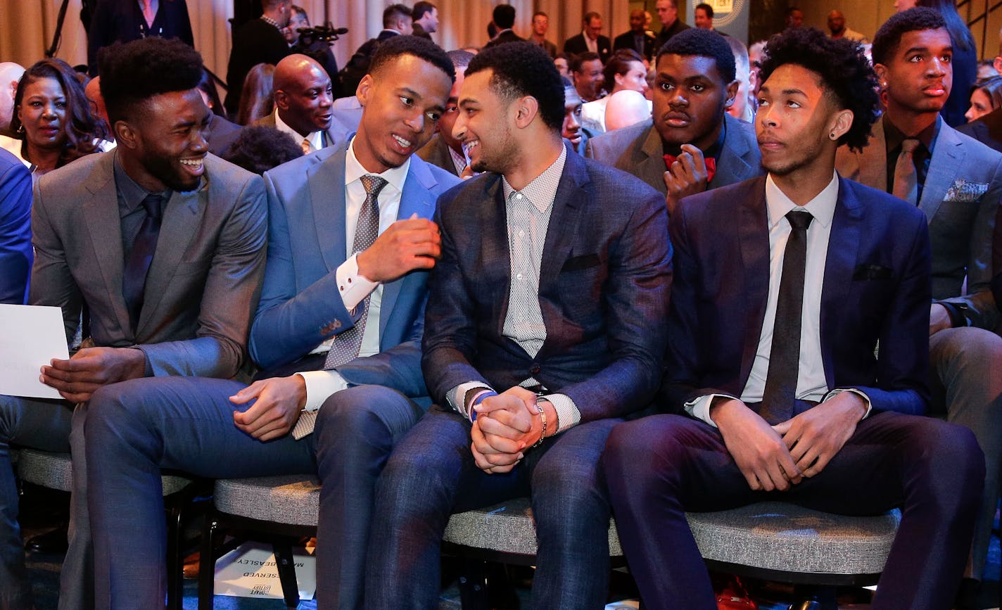 From left, NBA draft prospects Jaylen Brown, Skal Labissiere, Jamal Murray and Brandon Ingram talk before the start of the NBA basketball draft lottery, Tuesday, May 17, 2016, in New York. (AP Photo/Julie Jacobson)