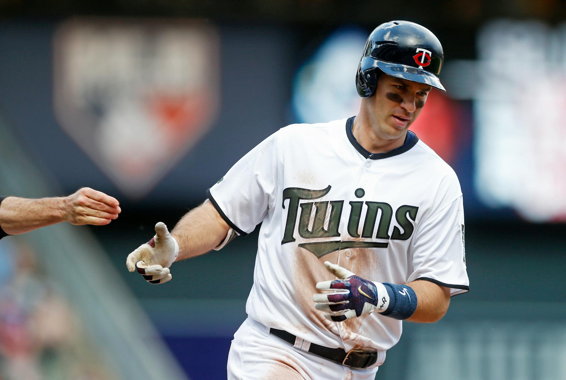 Minnesota Twins' Joe Mauer rounds third base on a solo home run off Tampa Bay Rays pitcher Ryan Garton in the seventh inning of a baseball game Sunday, May 28, 2017 in Minneapolis. (AP Photo/Jim Mone)