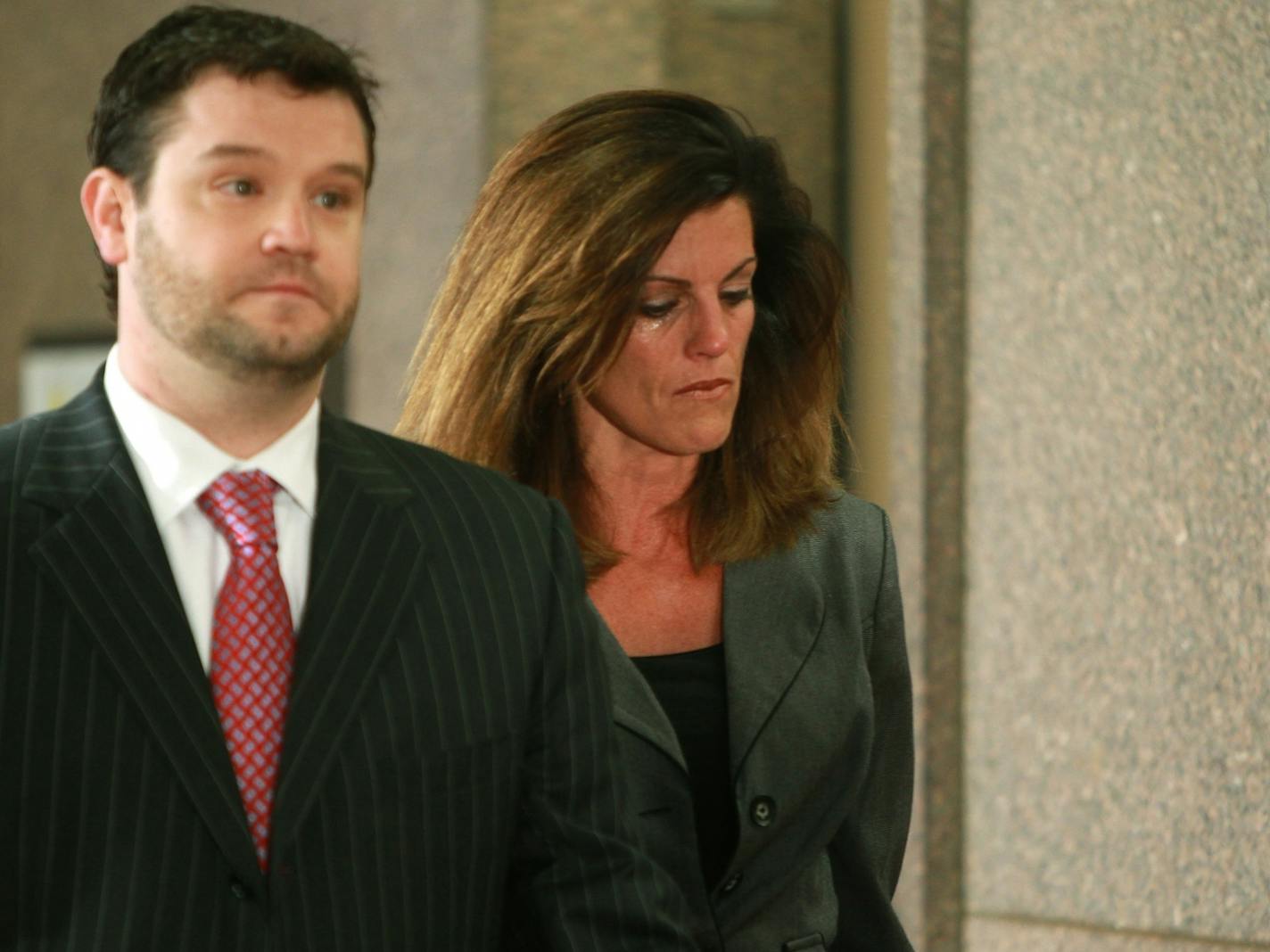 Amy Senser walked in with her attorney Eric Nelson to the security line at the Hennepin County Government Center as she prepared for the sentencing hearing, Monday, July 9, 2012. (ELIZABETH FLORES/STAR TRIBUNE) ELIZABETH FLORES � eflores@startribune.com