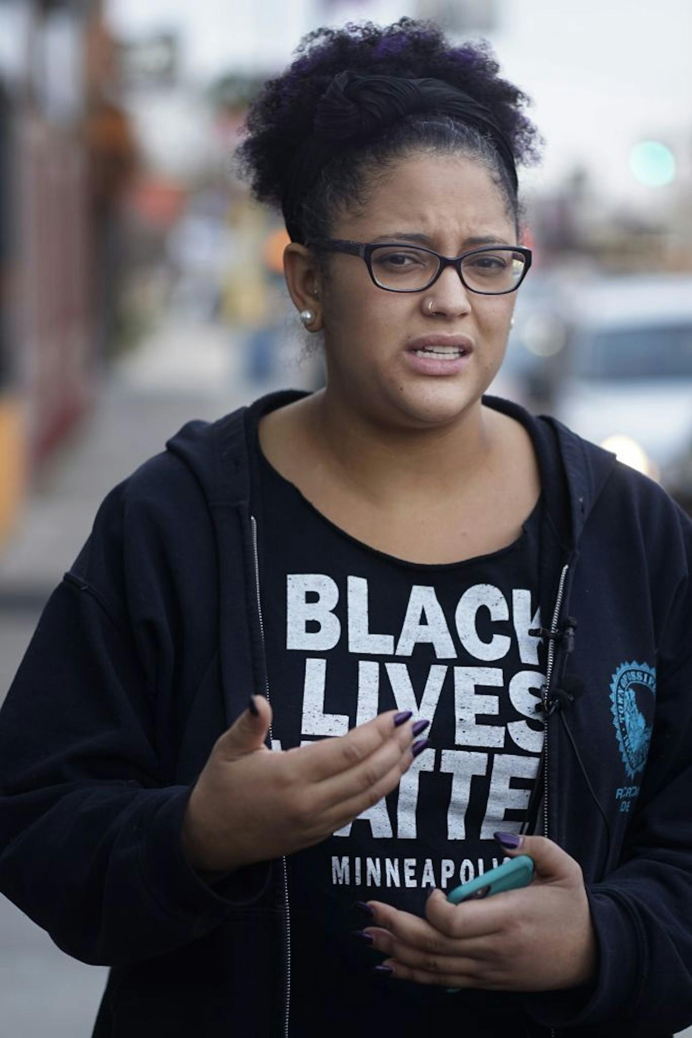 On the 1100 block of Broadway Ave W., Black Lives Matter activist Kandace Montgomery confirmed that organizers would be meeting over the direction of the movement demanding answers over the death of Jamar Clark who was shot and killed by police .