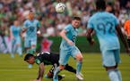 Minnesota United captain Wil Trapp, center, was among the 17 players the Loons left unprotected for Friday’s expansion draft.