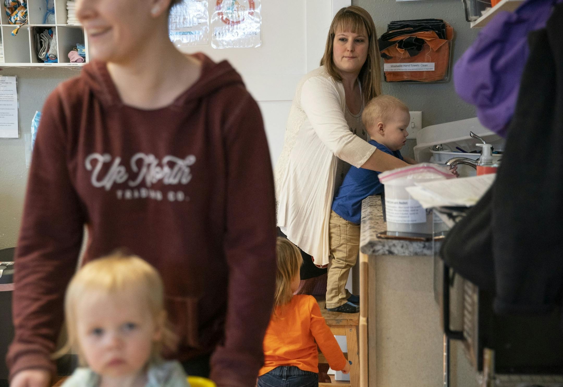 April Westman worked on washing Beau's hands for snack time at Aunty's Child Care in Duluth, MN on Thursday.