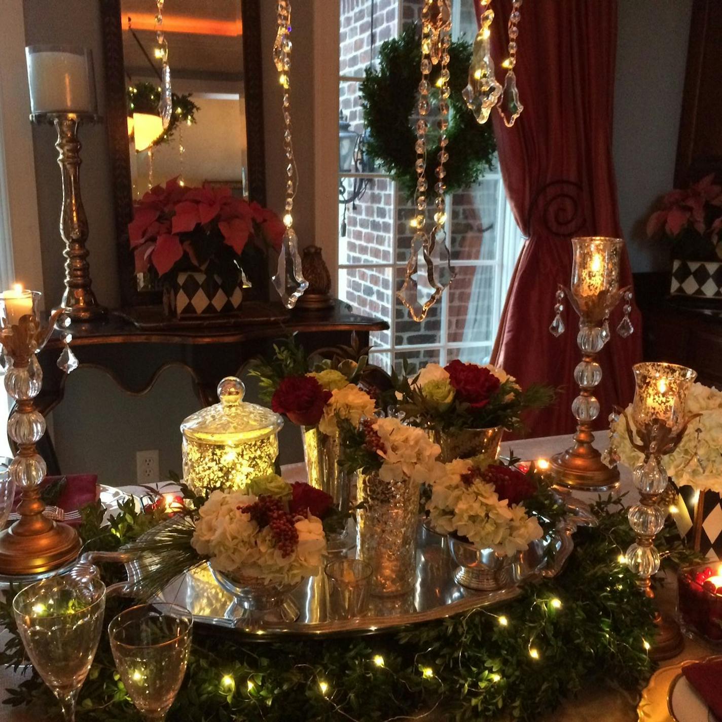 Marsha Hunt mingled old-fashioned wax candles with battery-operated LED white &#x201c;seed&#x201d; lights to trim her dining-room table.