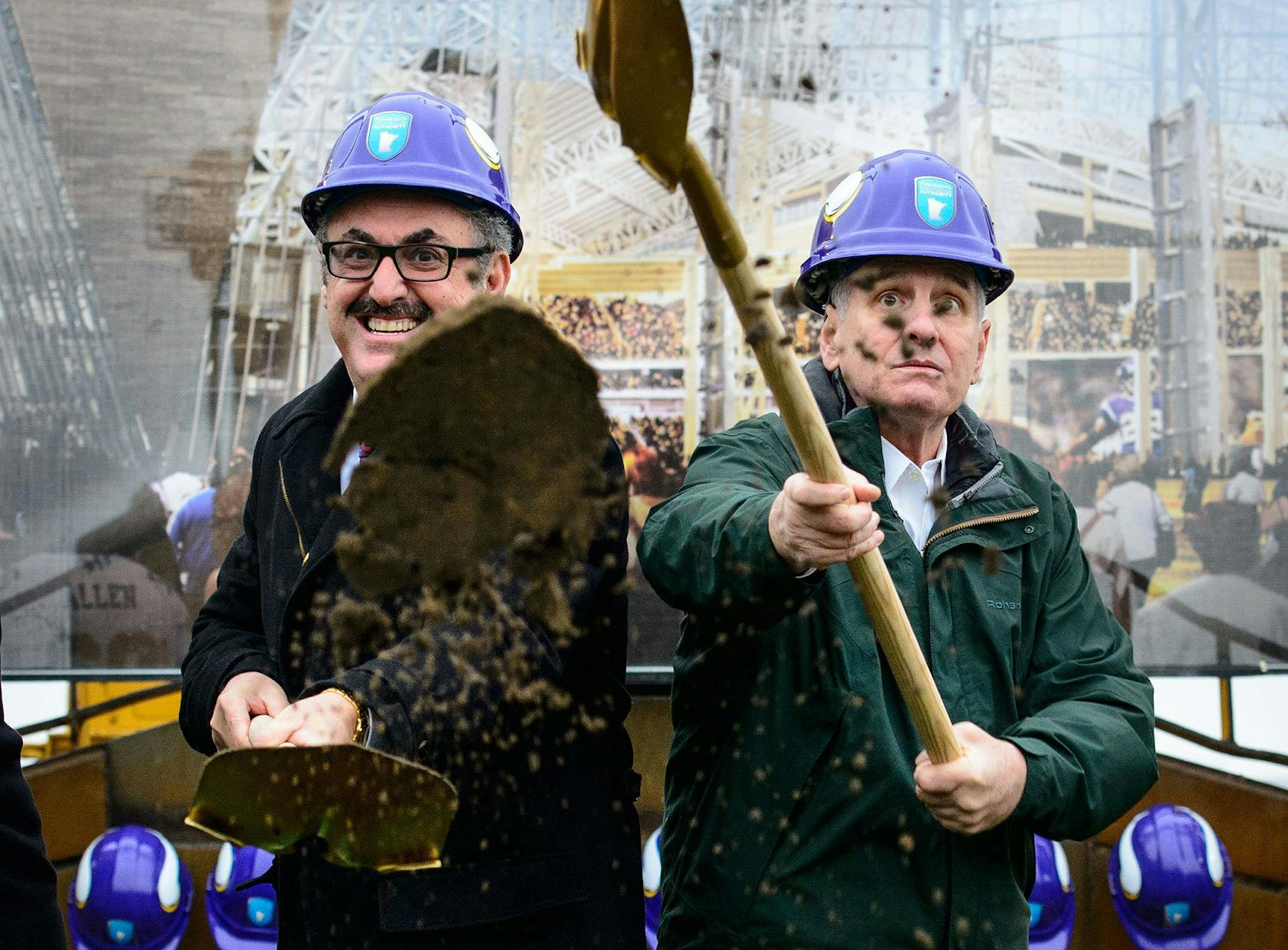 Minnesota Vikings owner Zygi Wilf, left, and Governor Mark Dayton shovel dirt at the groundbreaking ceremony outside the Metordome in Minneapolis on Tuesday, Dec. 3, 2013, as the team paves the way for a new home. (Glen Stubbe/Minneapolis Star Tribune/MCT) ORG XMIT: 1146334 ORG XMIT: MIN1312031923190471 ORG XMIT: MIN1312040924030671
